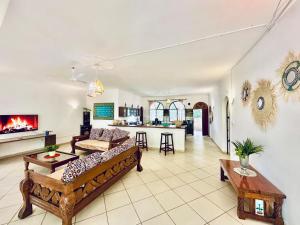 a living room with a couch and a table at The Garden Suite in Mtwapa