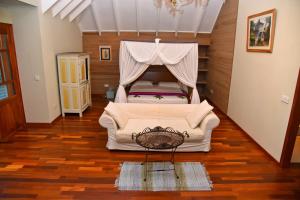 A bed or beds in a room at Demeure de Cap Macon