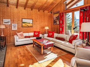 a living room with couches and a table at Chalet Veni- Vidi- Mansi by Interhome in Champex +41 photos