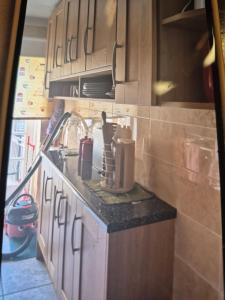 a kitchen with a counter with a mixer on it at 8 River view in King's Lynn