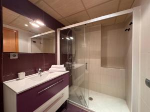 a bathroom with a sink and a shower at Casa Polaco in Valderrobres +14 photos