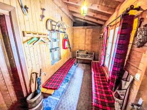 a room with a long bench in a house at Chalet Chalet Le Rhônasson by Interhome in Vercorin