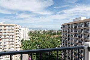 a view from the balcony of a apartment building at Affordable Condo in Cebu with Great Views in Suba