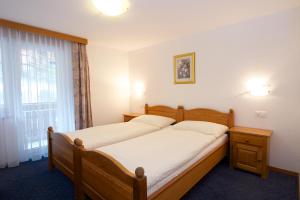 Postel nebo postele na pokoji v ubytování Bolero Appartements