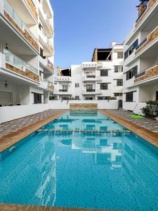 a swimming pool in the middle of a building at Visit Chamal - Horizon View in Oued Laou