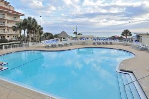 a large pool with blue water in a resort at TOPS'L Tides in Destin