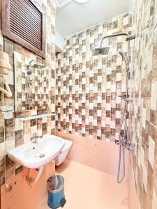 a bathroom with a sink and a shower at April Mansion in Istanbul +97 photos
