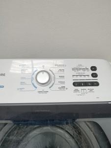 a top of a washing machine with the control panel at Apartamentos Novoa in San José