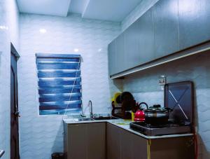 Cuina o zona de cuina de Mapleleaf Suites