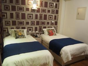 Postel nebo postele na pokoji v ubytování Successful 168 B&B