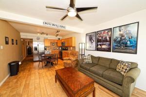 a living room with a couch and a table at Captain Jacks Pearl in Port Aransas