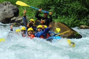 a group of people in a raft in a river at Ruca del Fuy in Panguipulli