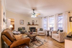a living room with a couch and a fireplace at Our Happy Nest in Boone