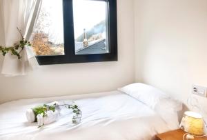 Postel nebo postele na pokoji v ubytování Andorra4days Soldeu - El Tarter