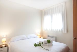 Postel nebo postele na pokoji v ubytování Andorra4days Soldeu - El Tarter