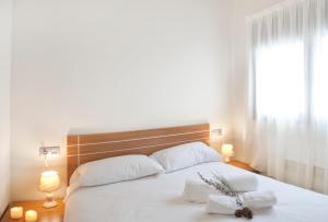Postel nebo postele na pokoji v ubytování Andorra4days Soldeu - El Tarter
