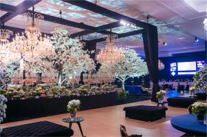 a large room with chandeliers and trees in it at Recanto Cataratas - Thermas, Resort e Convention in Foz do Iguaçu +91 photos