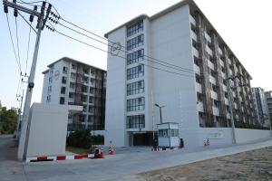 a white building with orange cones in front of it at Stylish Condo Near Nai Harn Beach Full Facilities Utopia M720 in Rawai Beach