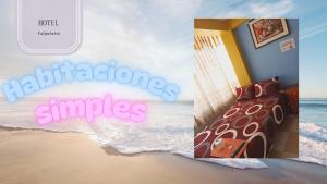 a book with a picture of a hotel on the beach at Hotel Valparaiso in San Antonio