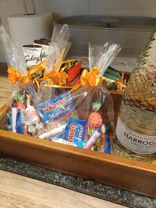 a drawer filled with food and other snacks at Cozy 3bed Cottage near Harrogate & Yorkshire Dales in Darley