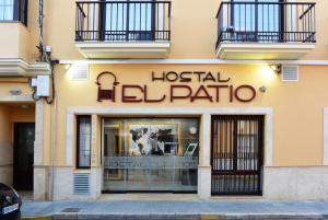 a store front of a hospitaliliato building at Hostal Boutique El Patio Lepe in Lepe