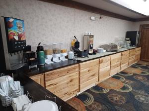 a counter in a room with aasteryasteryasteryasteryasteryasteryasteryasteryastery at Quality Inn Conference Center Logansport in Logansport