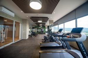 a gym with rows of treadmills and ellipticals at Refugio Del Mar Bello Horizonte Playa Dormida in Santa Marta