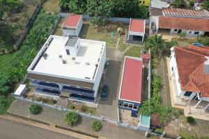 an overhead view of a house with a roof at Brisa Village in São Tomé