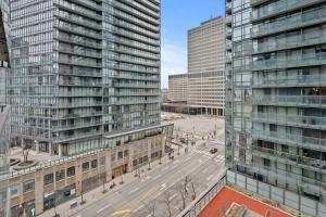 an aerial view of a city with tall buildings at Stylish 2BR Downtown Sanctuary - Free Parking in Toronto