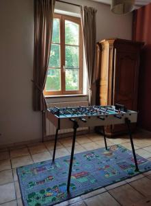 Taula de ping-pong a Ferme Moulin Henrot o a prop