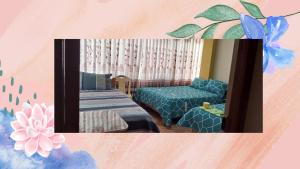 a room with a bed and a mirror at Hotel Valparaiso in San Antonio