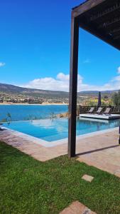 a pool with a view of the water at Le Figuier du Lac Bin elouidane in Bine el Ouidane +87 photos