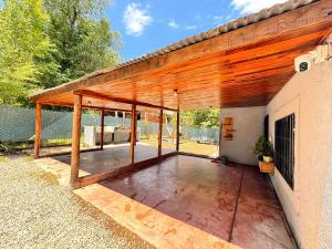 a large covered porch of a building at casa villa azul 1 in Tanti