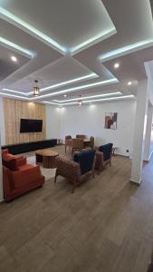 a living room with couches and a table at Ouakam Monument de la Renaissance 2 in Dakar