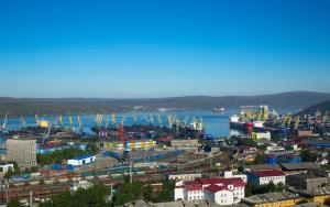 a city with a harbor and a body of water at AZIMUT City Hotel Murmansk in Murmansk