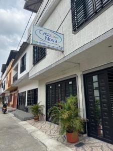 a building with a sign on the side of it at HOSPEDAJE CASANOVA FlORIDA VALLE in Florida