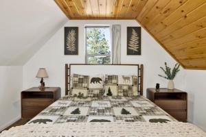 a bedroom with a bed and two night stands at Shiloh Woods Cabin Walk to Lake & Village Fireplace Cozy Retreat in Big Bear Lake