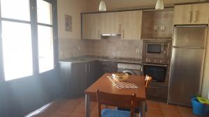 Kuchyň nebo kuchyňský kout v ubytování Casa Sampietro