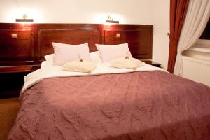 Posteľ alebo postele v izbe v ubytovaní Hotel Pod Orłem