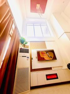 a room with a window and a basketball hoop at M3 Haven Masbate in Masbate