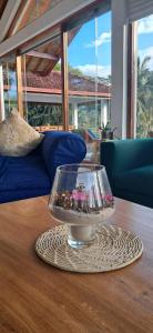 a glass bowl on a coaster on a table at The Glasshouse Victoria in Digana