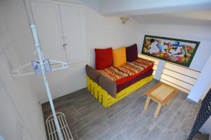 Łóżko lub łóżka w pokoju w obiekcie Colonna Terrace Apartment