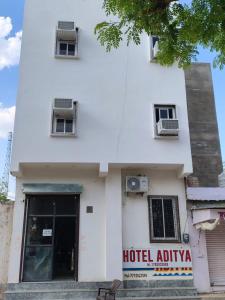 a white building with a hotel alpha at Hotel Aditya Bikaner in Deshnoke