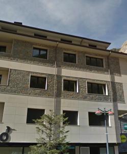a building with windows on the side of it at Canillo L'Areny Star HUT - 8303 in Canillo