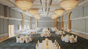 a large banquet hall with white tables and chandeliers at Hotel Yak & Yeti in Kathmandu