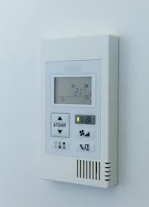 a small white microwave with buttons and controls at Roatel Willich A44 my-roatel-com in Willich