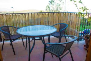 Un balcón o terraza de Apartmentos Corona