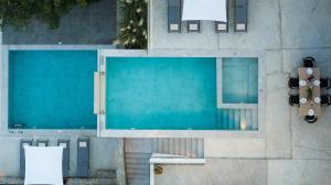 an overhead view of a swimming pool at Arbora Olea Luxury Villas in Skaleta