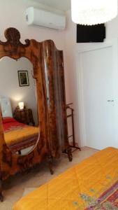 Postel nebo postele na pokoji v ubytování B&B Domus Lupiae
