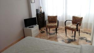 TV a/nebo společenská místnost v ubytování B&B Domus Lupiae